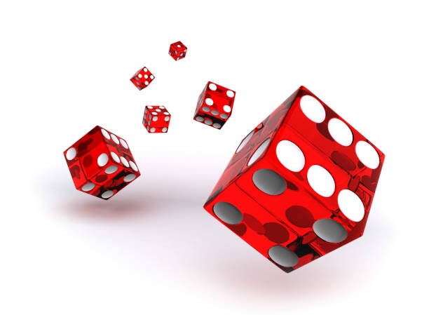 Live dealer dealing cards at a Baccarat table